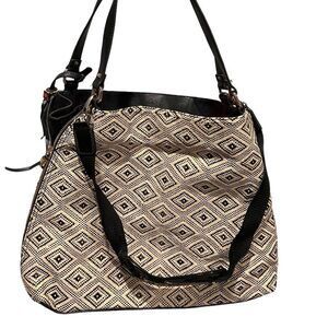 Stella &  Dot‎ tan and black tote bag with long and short should handles/strap.
